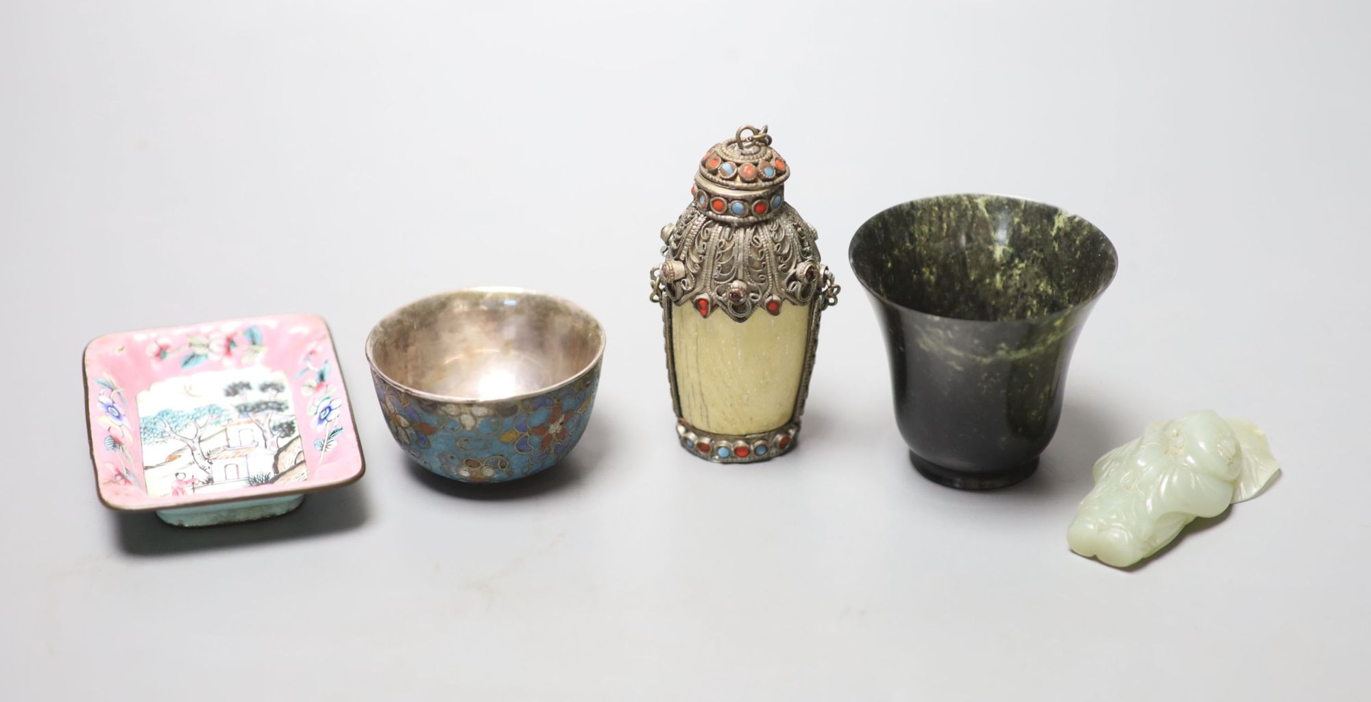 Assorted Chinese small items, including a celadon jade figure of a boy grasping a lotus leaf, 6.7cm, snuff bottle, cloisonne enamel cup